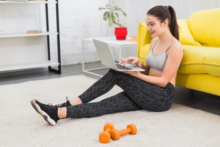 Person doing a home workout routine for weight loss in a living room